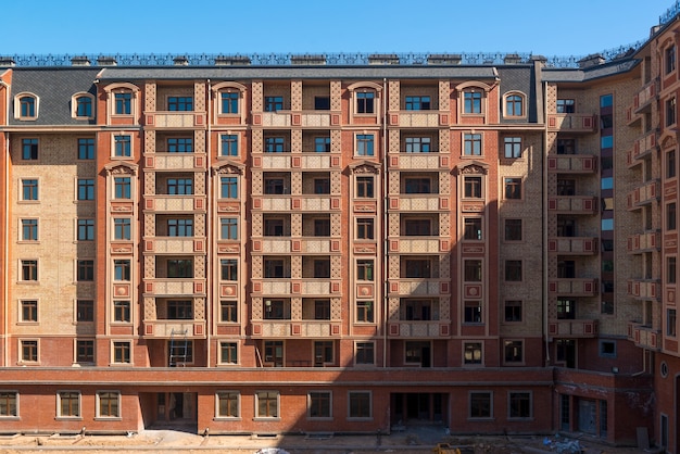 Modern apartment complex design. Building under construction