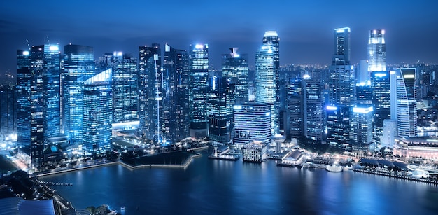 Modern architecture, office building cityscape background. Singapore City. Blue filter.