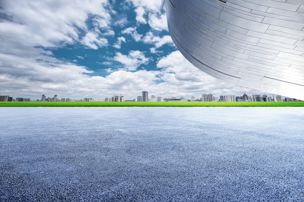 Modern architecture and unmanned asphalt pavement under the blue sky