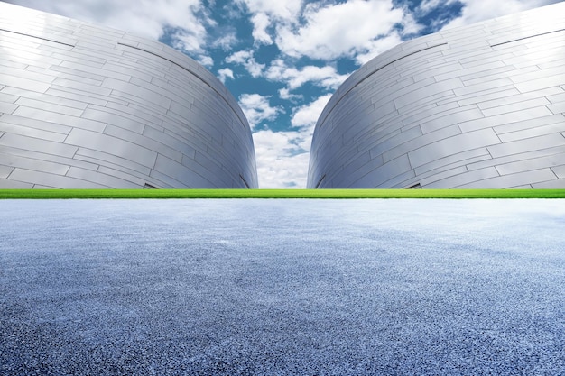 Modern architecture and unmanned asphalt pavement under the blue sky