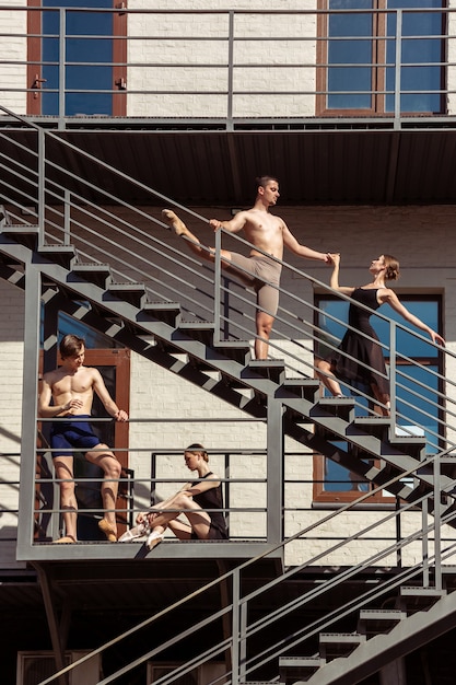 Modern ballet dancers performing outdoors