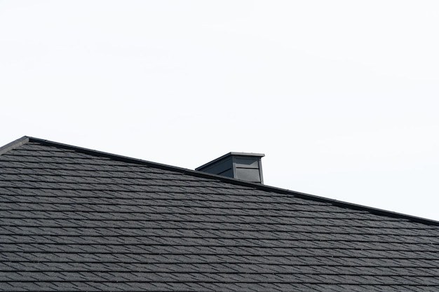 Modern black roof Types of a roof of roofs New house