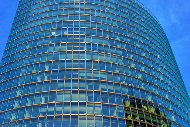 Modern Blue glass European apartment house and business building architecture in German City centre in Berlin in Germany in Europe.