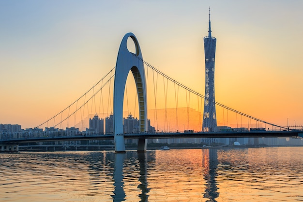 Modern bridge in Zhujiang river and modern building 