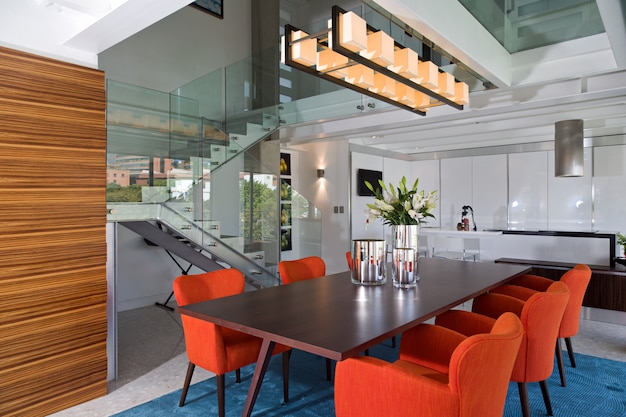 Modern and bright dining room of luxurious apartment.