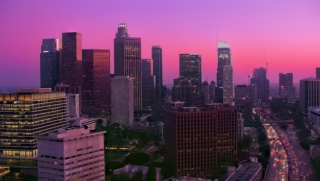 Photo modern buildings against sky during sunset