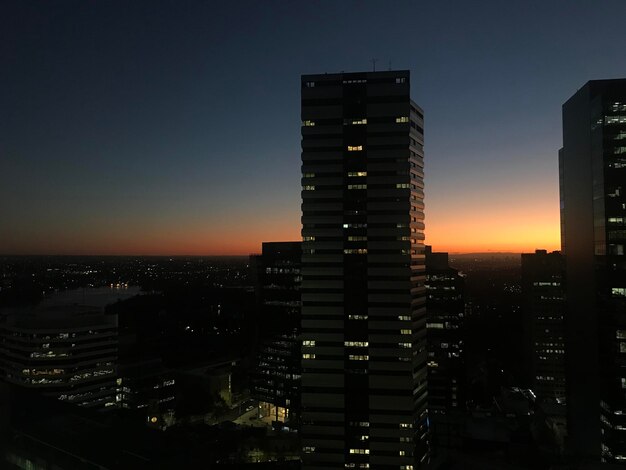 Modern buildings in city at night