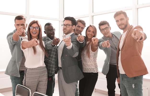 Modern business team pointing at youthe concept of choice