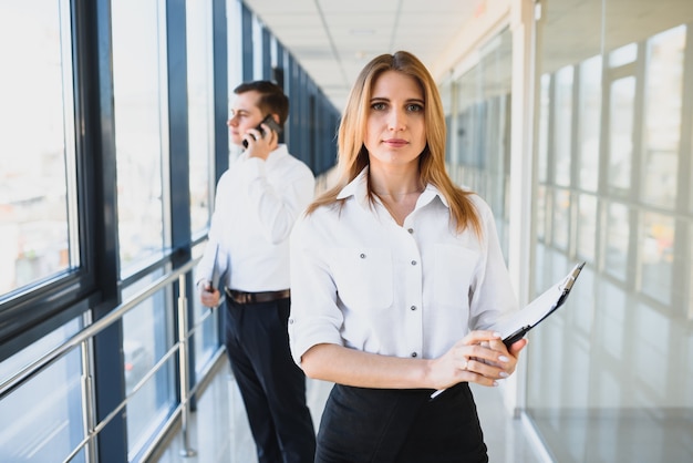 Modern business woman in the office with copy space