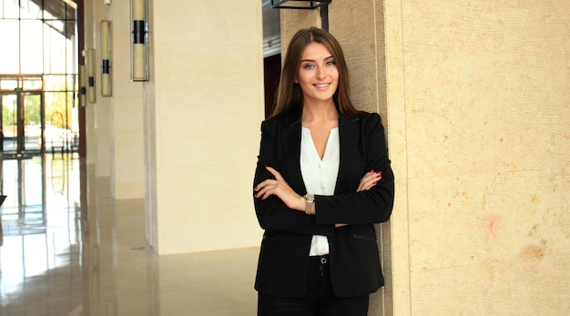 Modern business woman in the office with copy space