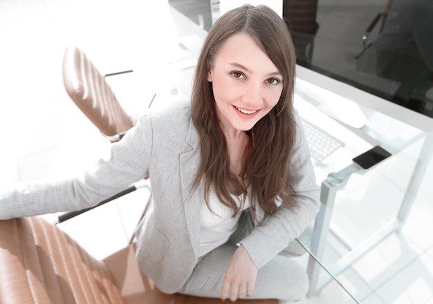 Modern business woman sitting at her Desk