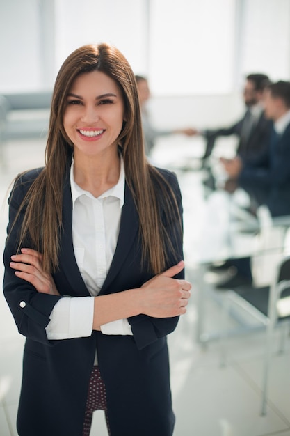 Modern business woman standing in bank office