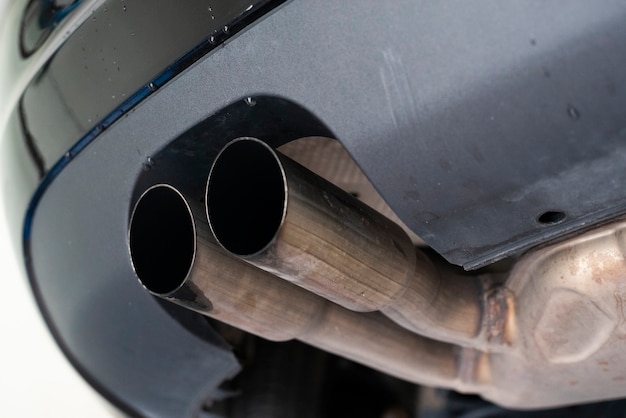 Photo modern car exhaust detail taken from below