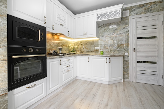 Modern classic white kitchen interior with wooden furniture