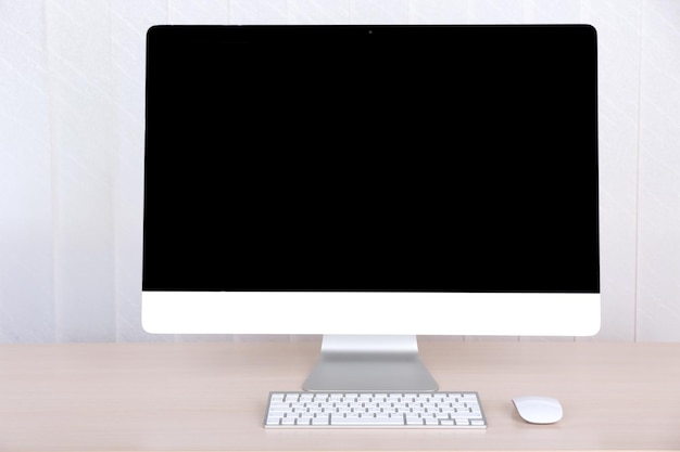 Modern computer on wooden table