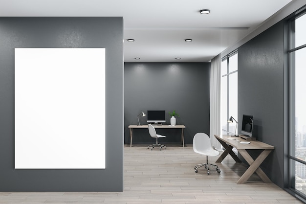 Modern coworking office with vertical poster on wall