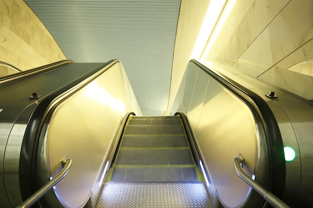 modern escalator abstract background, blurred light background geometry transport