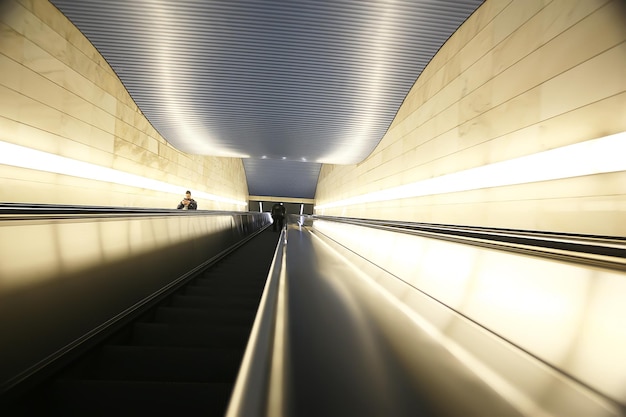 modern escalator abstract background, blurred light background geometry transport