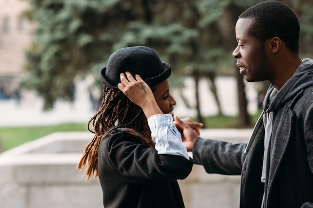 Modern fashion style. Happy young black couple. Smiling people, love relationship, beauty concept