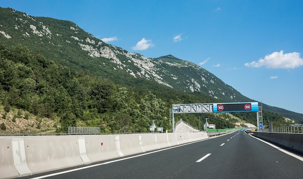 Modern freeway with digital traffic signs Speed limits Observance of a speed mode