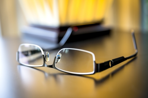 Modern Glasses on a reflective surface