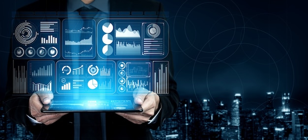 Modern graphic interface shows massive information of business sale report, profit chart and stock market trends analysis on screen monitor.