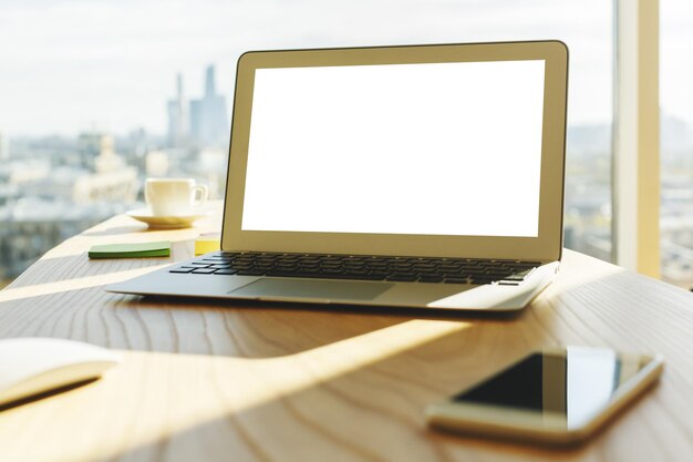 Modern hipster with blank laptop