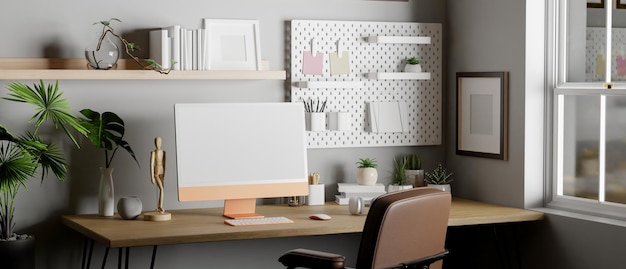 Modern home working room with computer and accessories on wood table against grey wall