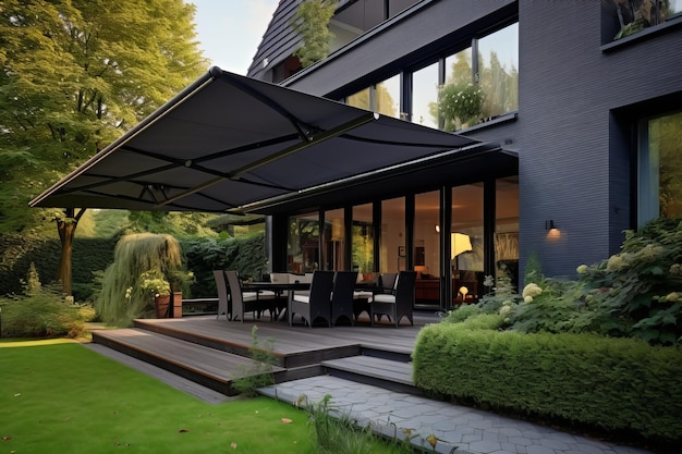 Modern house summer terrace with stylish canopy and comfortable outdoor seating area