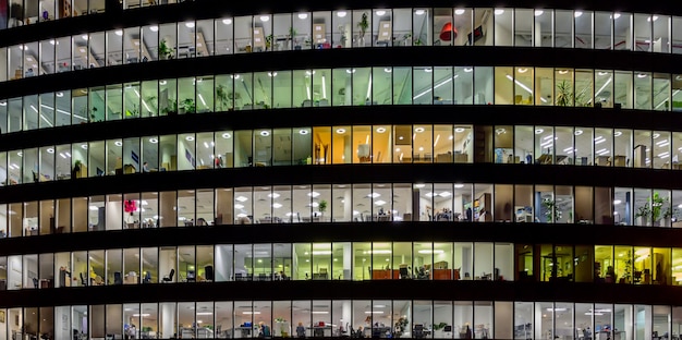 Modern illuminated Office building windows at night