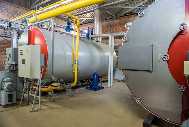 Modern industrial boiler room with compressor equipment. control panel