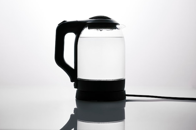 Modern kettle on white background