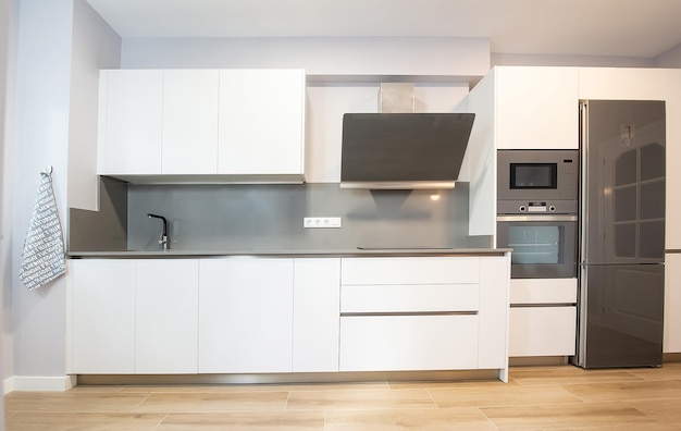 modern kitchen perfectly equipped with its appliances in a house