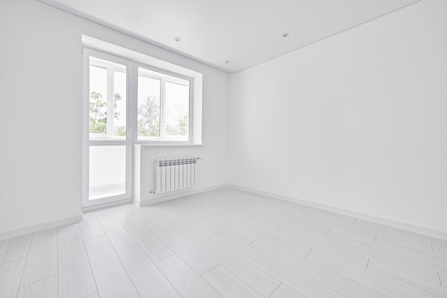 Modern light white empty living room with window. No people