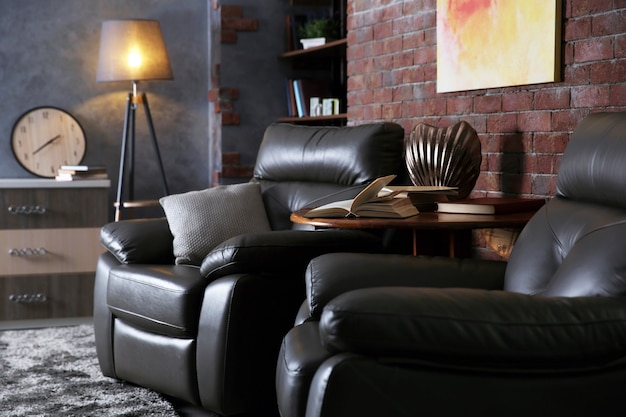 Modern living room interior with leather armchairs