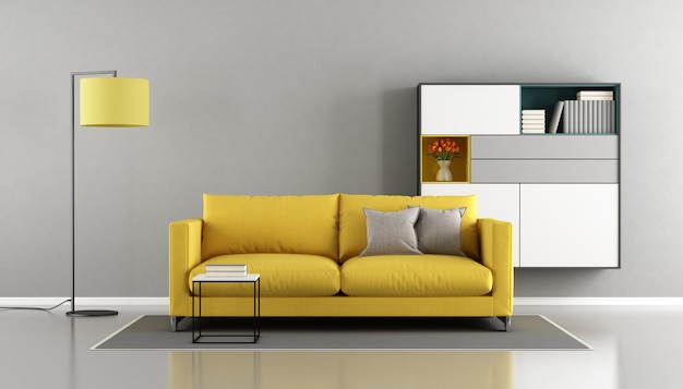 Modern living room with yellow couch and sideboard on wall. 3d rendering