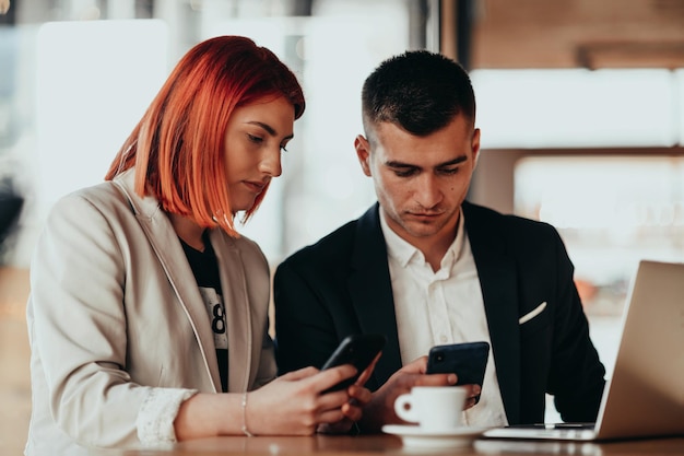 modern man and woman use modern devices, laptop, tablet, and smartphone and arrange new projects for the job