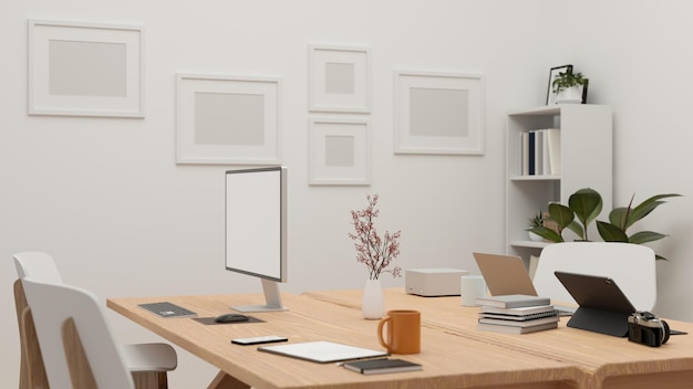 Modern minimal office studio workplace with computer office accessories and decors on wood table