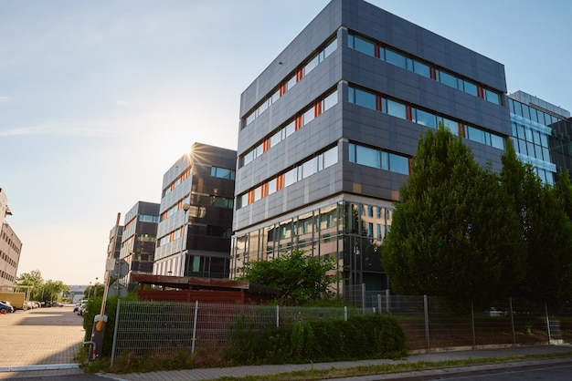 Modern office building with green trees