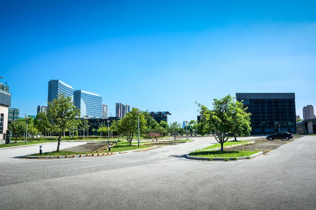 Modern office building with traffic in motion blur