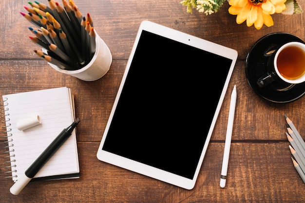 Modern office desk composition with technological device