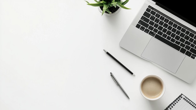 Photo modern office desk setup with laptop and plant on desk near coffee cup