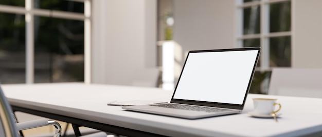 Modern office workspace with notebook laptop mockup on white meeting table closeup image