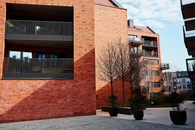 Modern residential complex in Gdansk Poland Living house facade with balconies Apartment building Mortgage in real estate