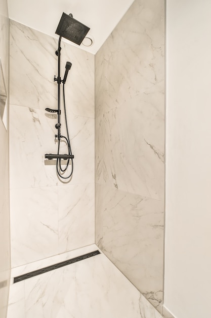 Modern shower stall in a bright bathroom