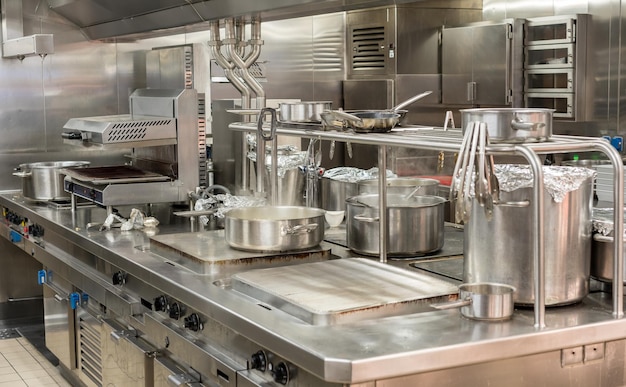 Modern stainless steel hobs in commercial kitchen