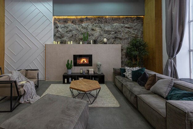 Modern studio interior with decorative stone walls in grey stone wood tiles and led lighting in the design of the room