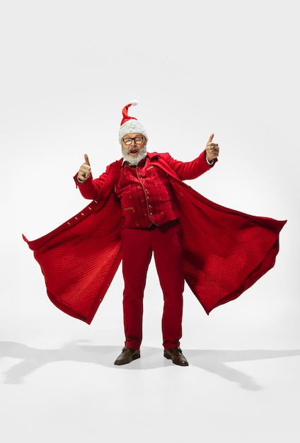 Photo modern stylish santa claus isolated on white background, copyspace