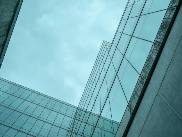 Modern sustainable green glass office building Exterior view of corporate headquarters glass