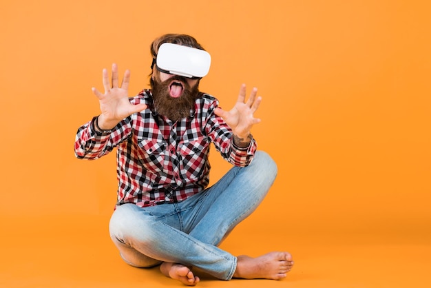 Modern technologies man with glasses of virtual reality Future technology concept Visual reality concept guy getting experience using VRheadset glasses bearded hipster use modern technology